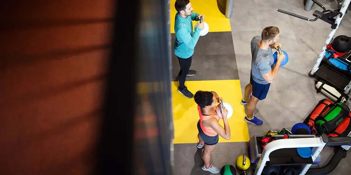 a group of people in a gym